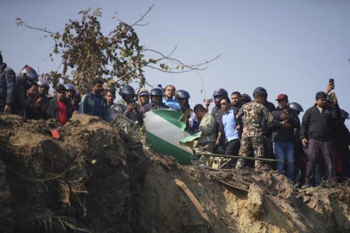 68 dead, 4 missing after plane crashes in Nepal resort town. | PHOTO/AP.