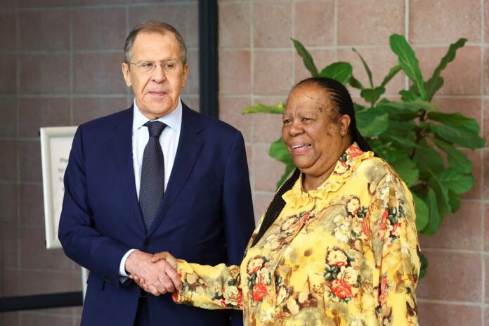 South Africa's Foreign Minister Naledi Pandor shakes hands with Russia's Foreign Minister Sergei Lavrov, ahead of their bilateral meeting in Pretoria, South Africa, January. (Photo REUTERS)