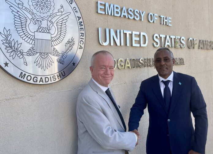 U.S Ambassador to Somalia, Larry Andrea and Somali foreign minister Abshir Omar