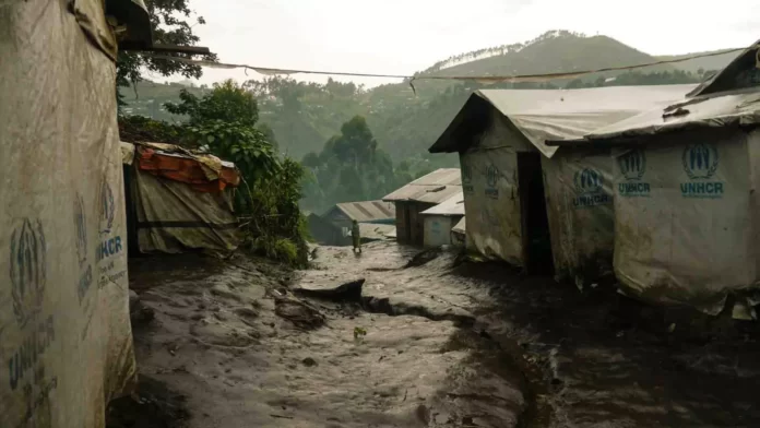 Rain washes through a displacement camp in DR Congo’s eastern Masisi territory. The camps have mushroomed in size as people escape an insurgency by the M23 armed group.