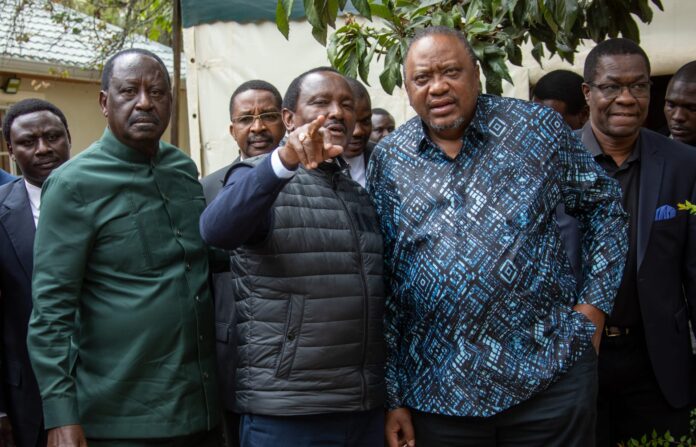 Former president Uhuru Kenyatta is seen joining members of the opposition leaders Raila Odinga and Kalonzo Musyoka during a requiem mass for protesters killed during recent protests in Nairobi.