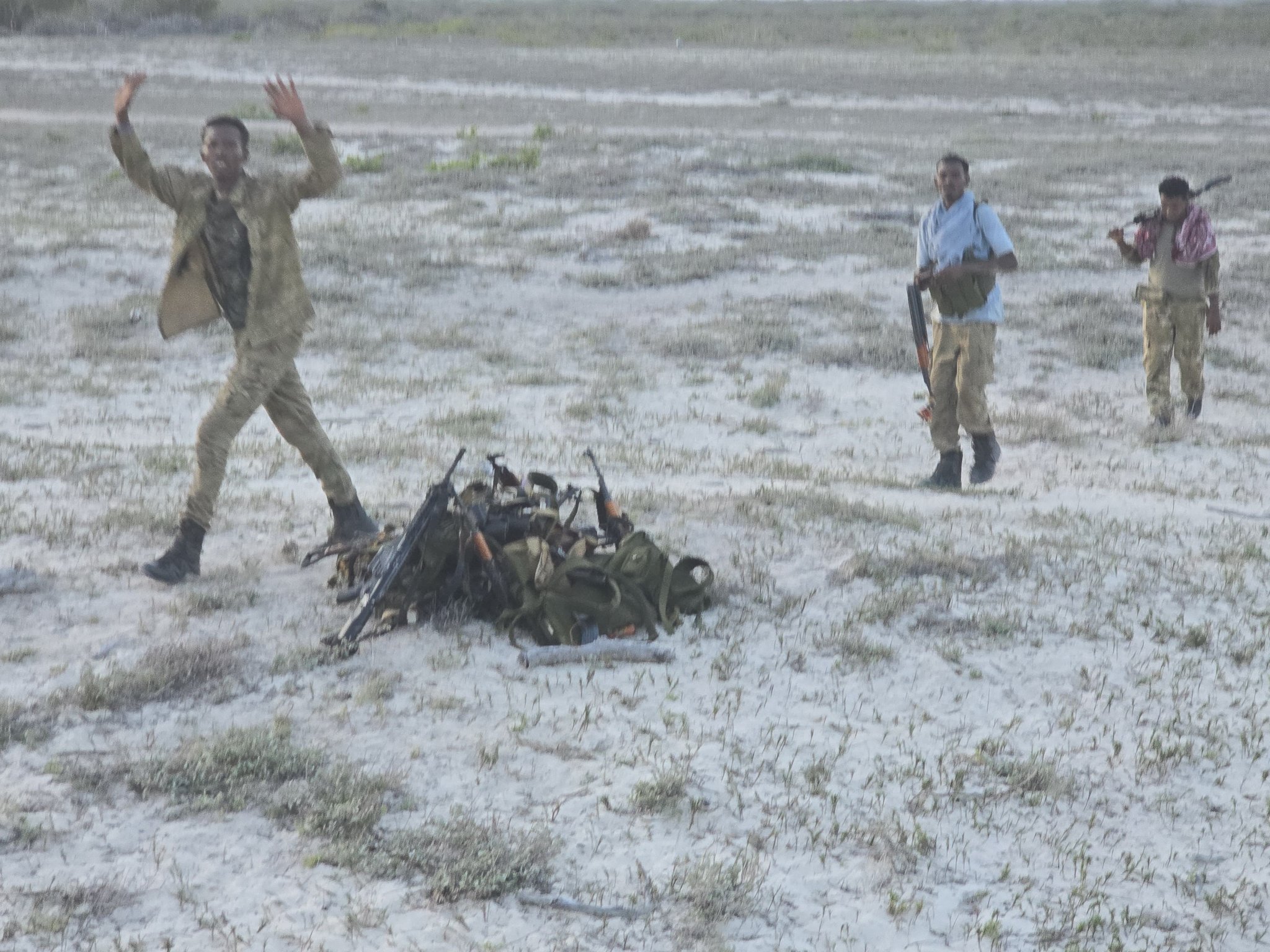 Somalia federal forces fled to Kenya, where they were seen surrendering after the defeat in Raaskaambooni.