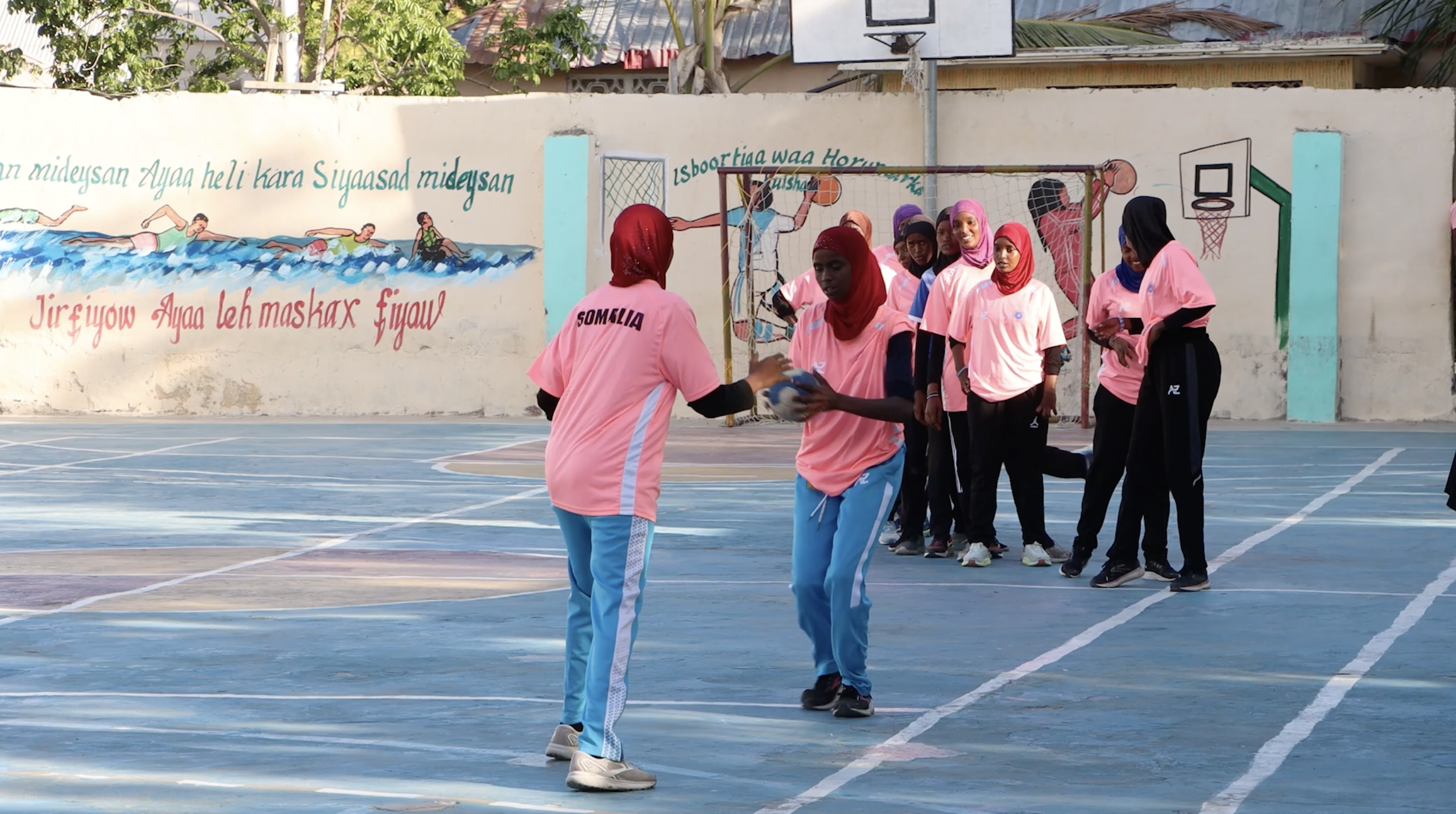Today, these young women’s handball team battles not only cultural barriers but also financial hardship. The players have just one pair of clothing and shoes to train in. Today, these young women’s handball team battles not only cultural barriers but also financial hardship. The players have just one pair of clothing and shoes to train in.