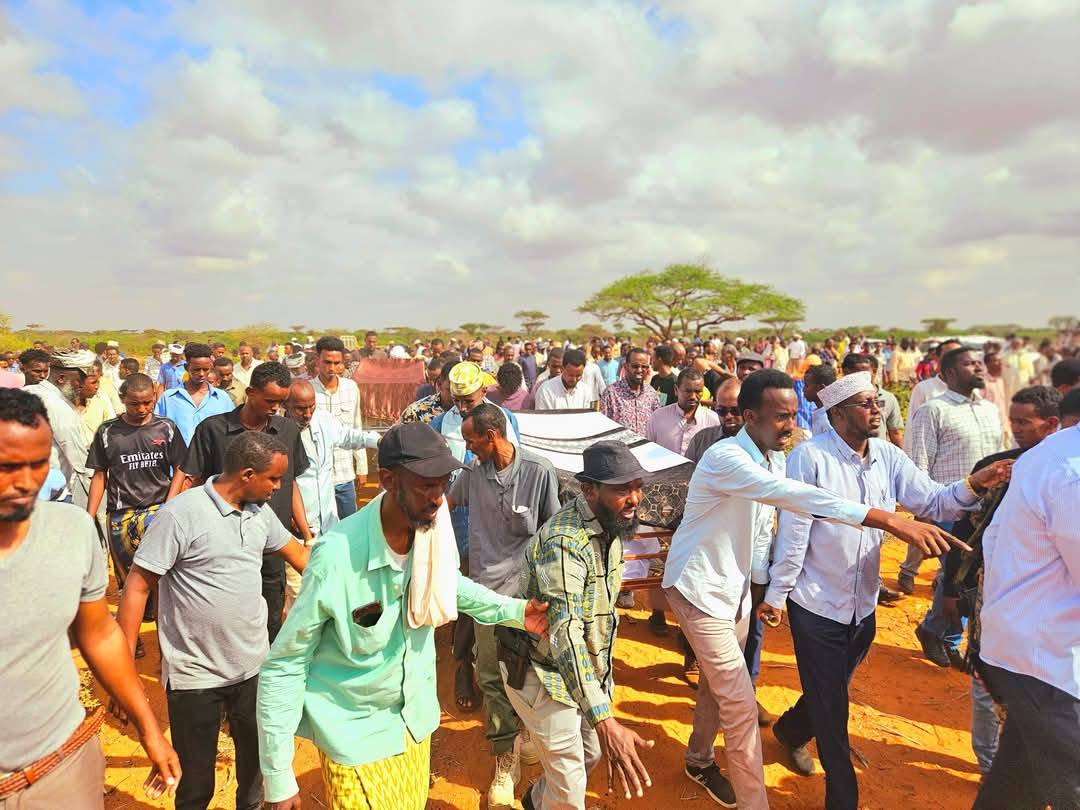 The burial took place Monday in Bur Saalax, attended by hundreds of local residents and regional officials. The burial took place Monday in Bur Saalax, attended by hundreds of local residents and regional officials.
