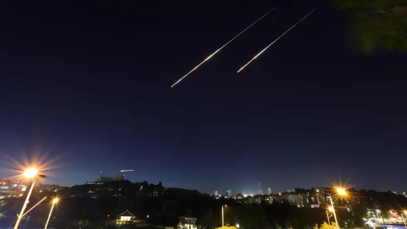 Light trails seen over Jerusalem as missiles are fired from Iran on Sunday night, 15 June 2025. Light trails seen over Jerusalem as missiles are fired from Iran on Sunday night, 15 June 2025.