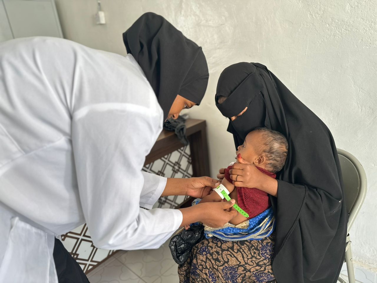 In this photo, a Somali mother and her child is seen inside Mother and child health clinic run by UNICEF.