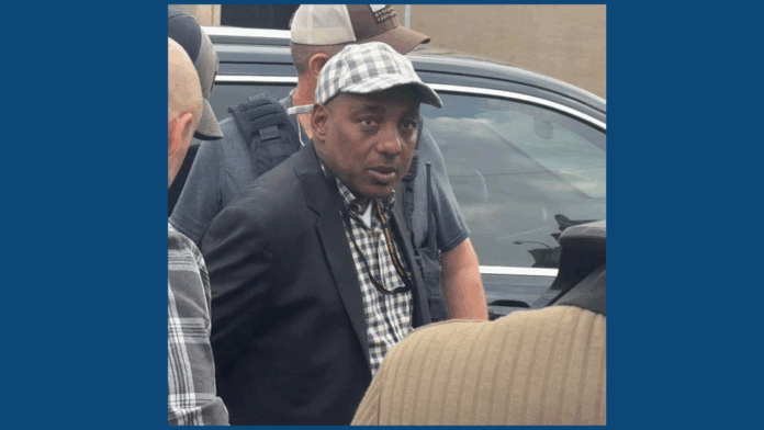 Photo posted online shows Omar Jamal escorted by ICE.