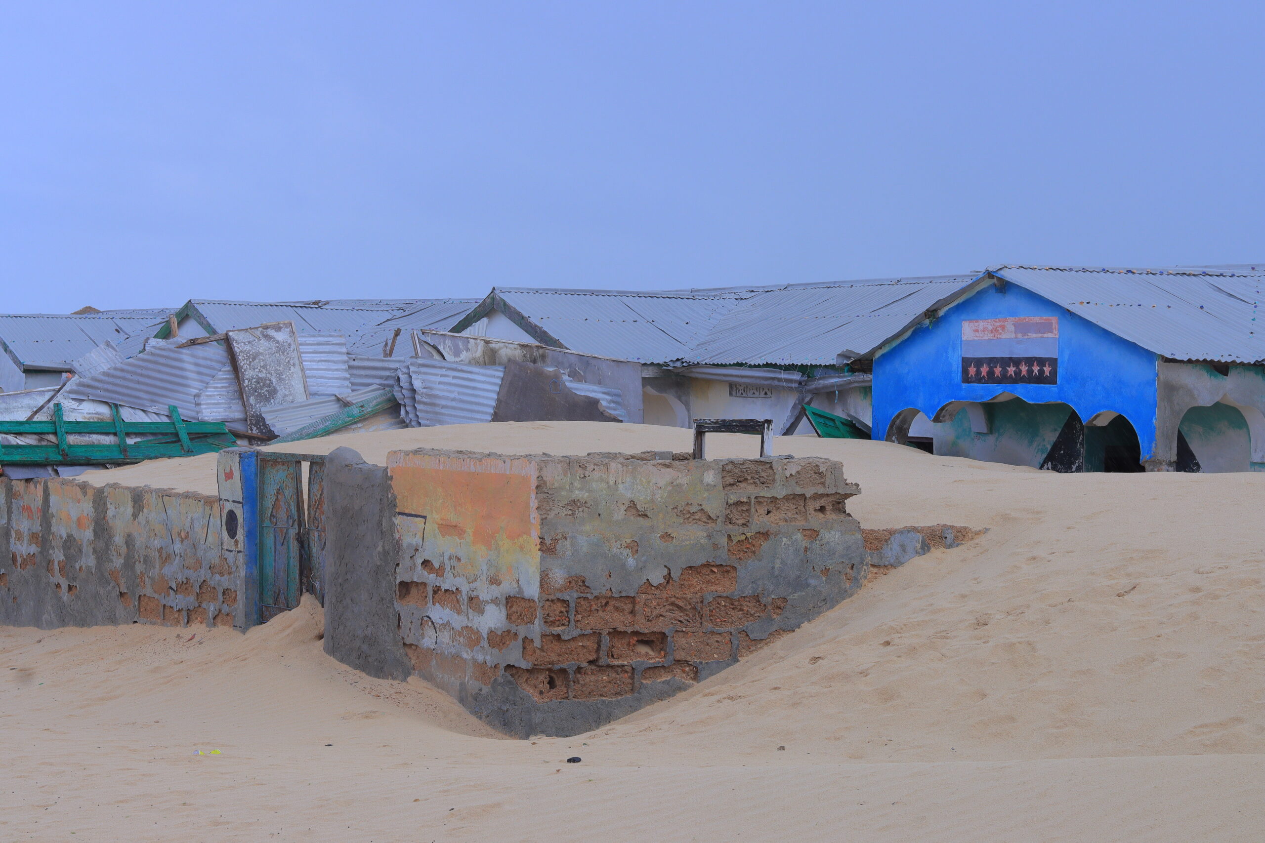 Abandoned houses in Kulub village, eastern Mudug region, central Somalia. Most residents have fled after their homes were buried by encroaching sand. Photo taken on September 2, 2025. Photographer: Said Abdullahi.