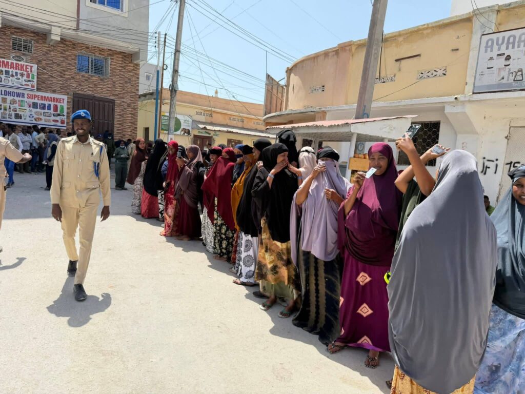 People queue at a polling site in Shangani, Mogadishu, on Thursday, 25 December 2025.