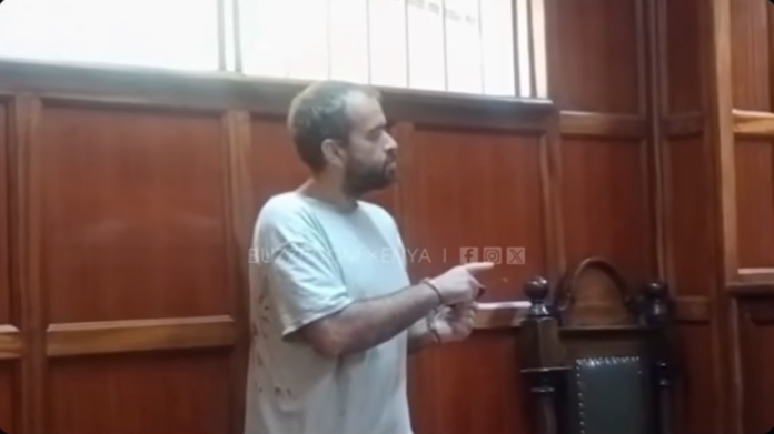American national Hodgkinson Enock Jedidah appears in court on immigration related charges. |BUZZROOM KENYA| PHOTO.