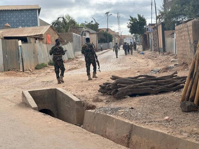 Rival forces clash inside Baidoa as political dispute escalates into armed conflict.