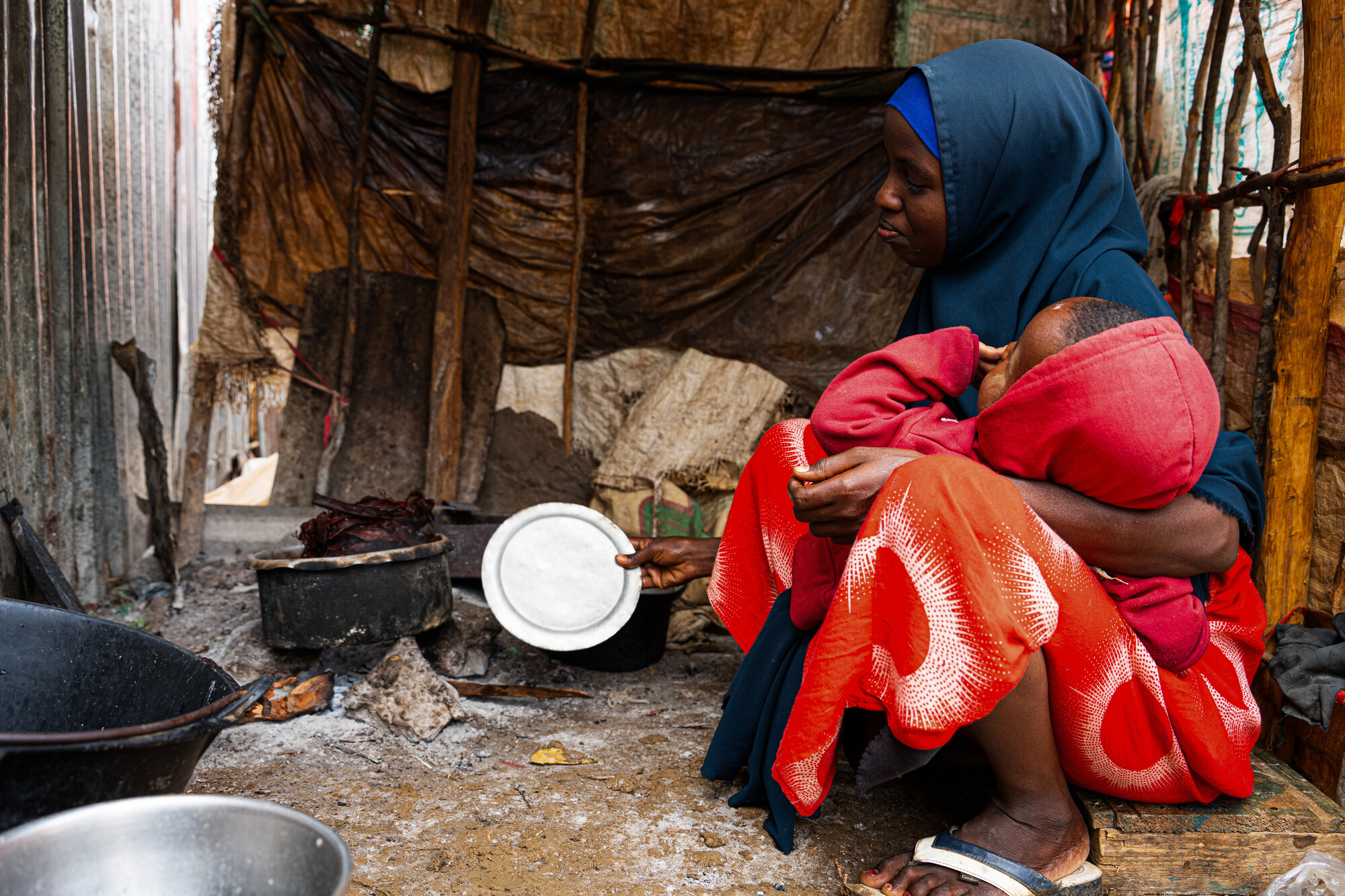 Farhia Isack, a 28 year old displaced mother of five children who was displaced from the Bay region after the prolonged drought wiped out her means of survival. Photo credit: NRC/ Abdulkadir Mohamed.